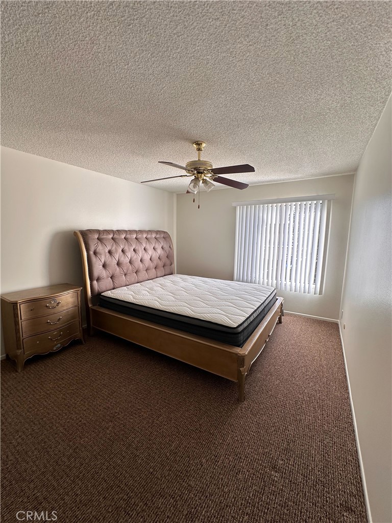 957 South Landmark Lane Anaheim, CA 92805 - Photo 19 of 24 a living room with furniture and a window
