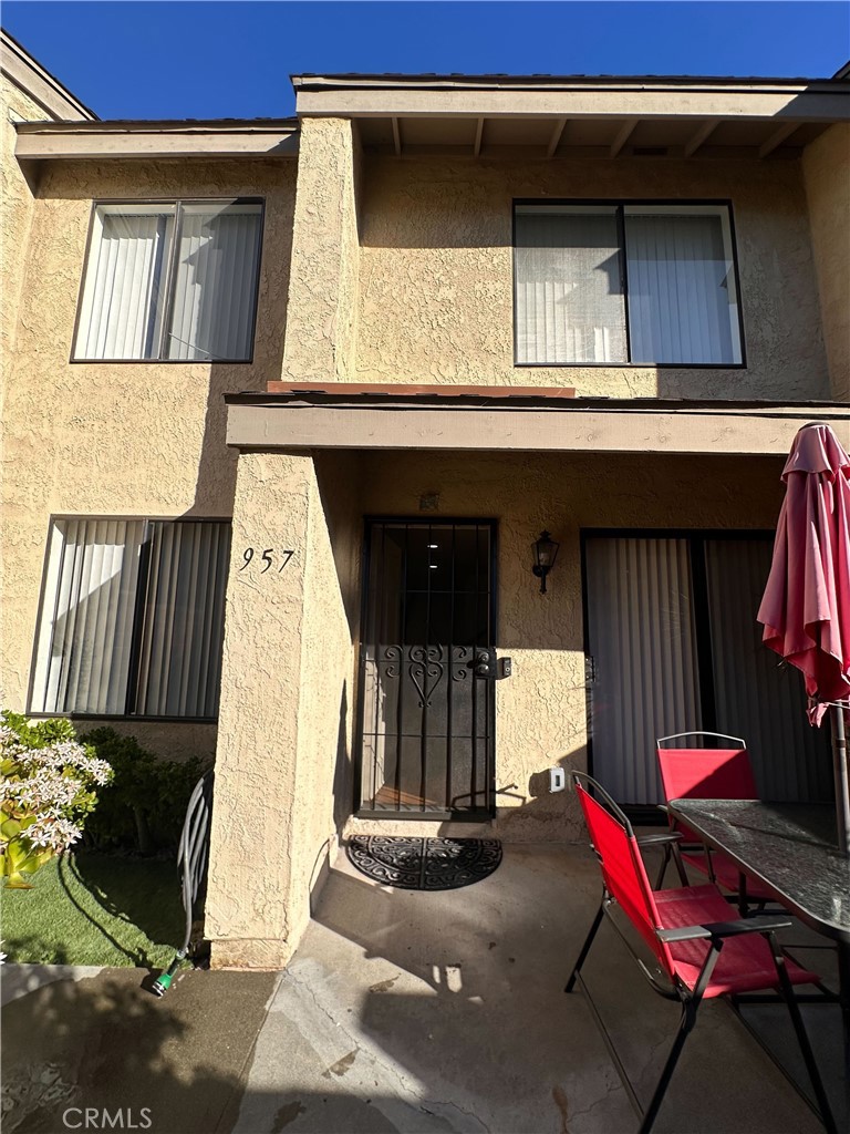 957 South Landmark Lane Anaheim, CA 92805 - Photo 5 of 24 a view of a house with large windows