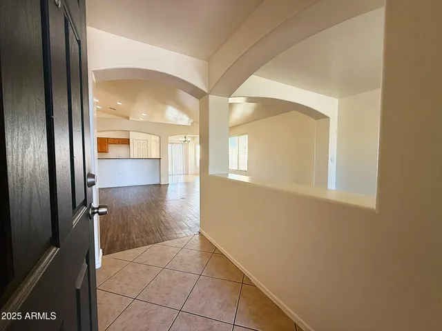 a bathroom with a glass door shower and a sink