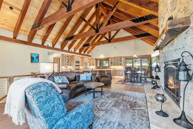 a living room with furniture and a view of chandelier