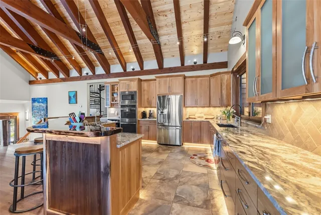a view of a kitchen and living room
