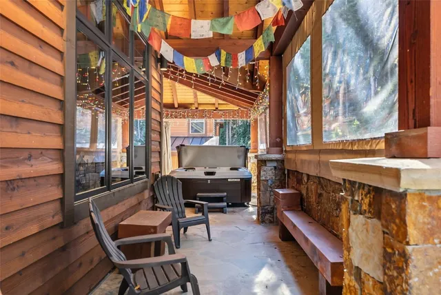 a view of a chairs and table in the patio