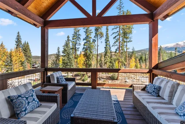 a living room with large windows