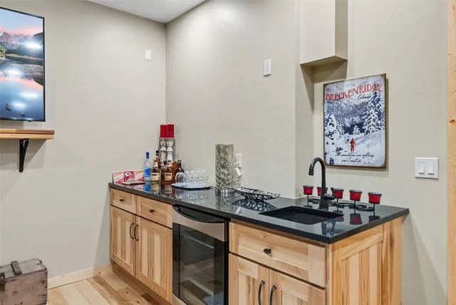 a kitchen that has a sink and a stove