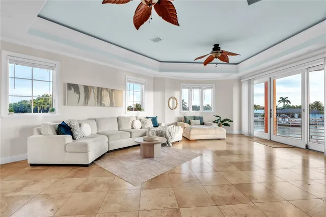 a bedroom with a bed and a potted plant