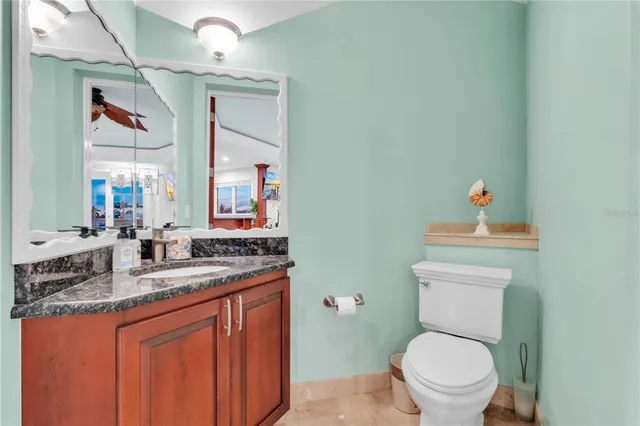 a view of a balcony with two chairs and a table