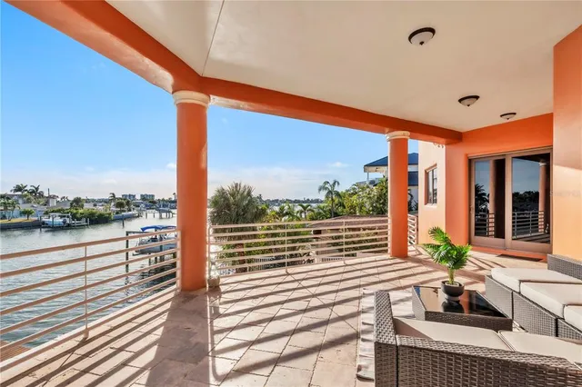 a kitchen with stainless steel appliances granite countertop a stove a sink dishwasher and a stove with wooden floor