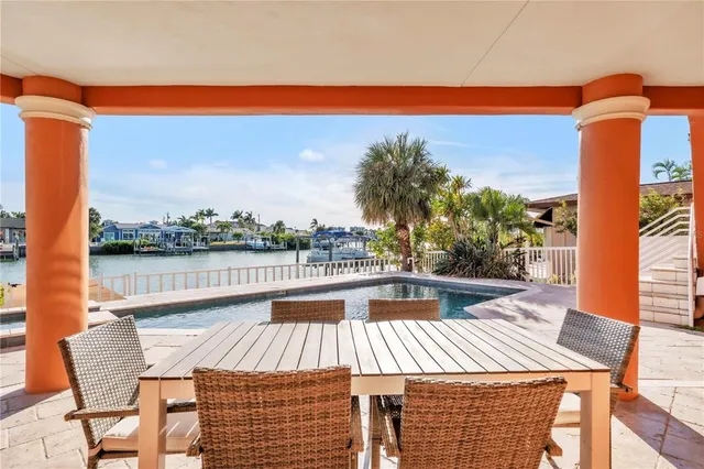 a bed room with a bed and a large window