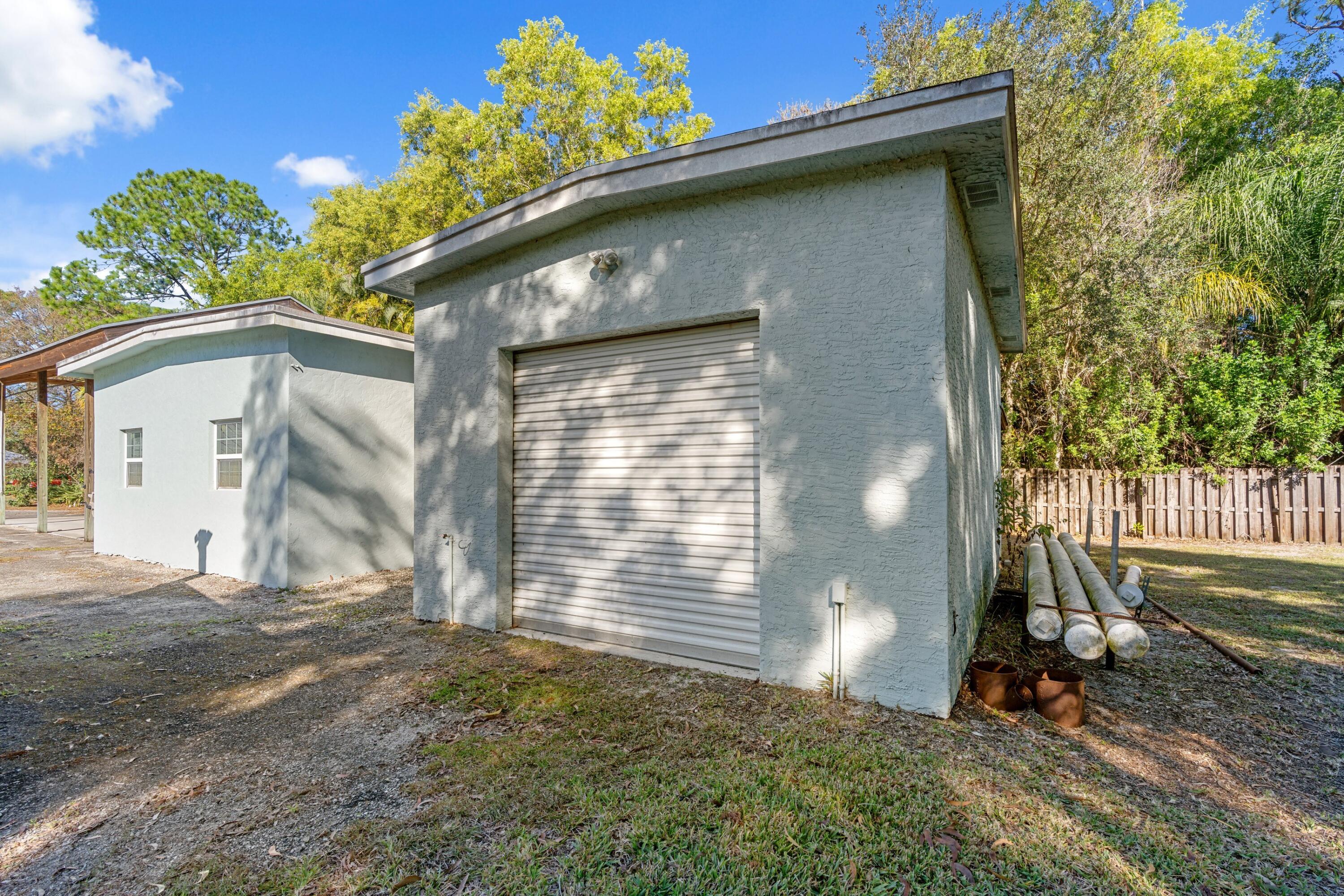 17392 Mellen Lane Jupiter, FL 33478 - Photo 24 of 38 a backyard of a house