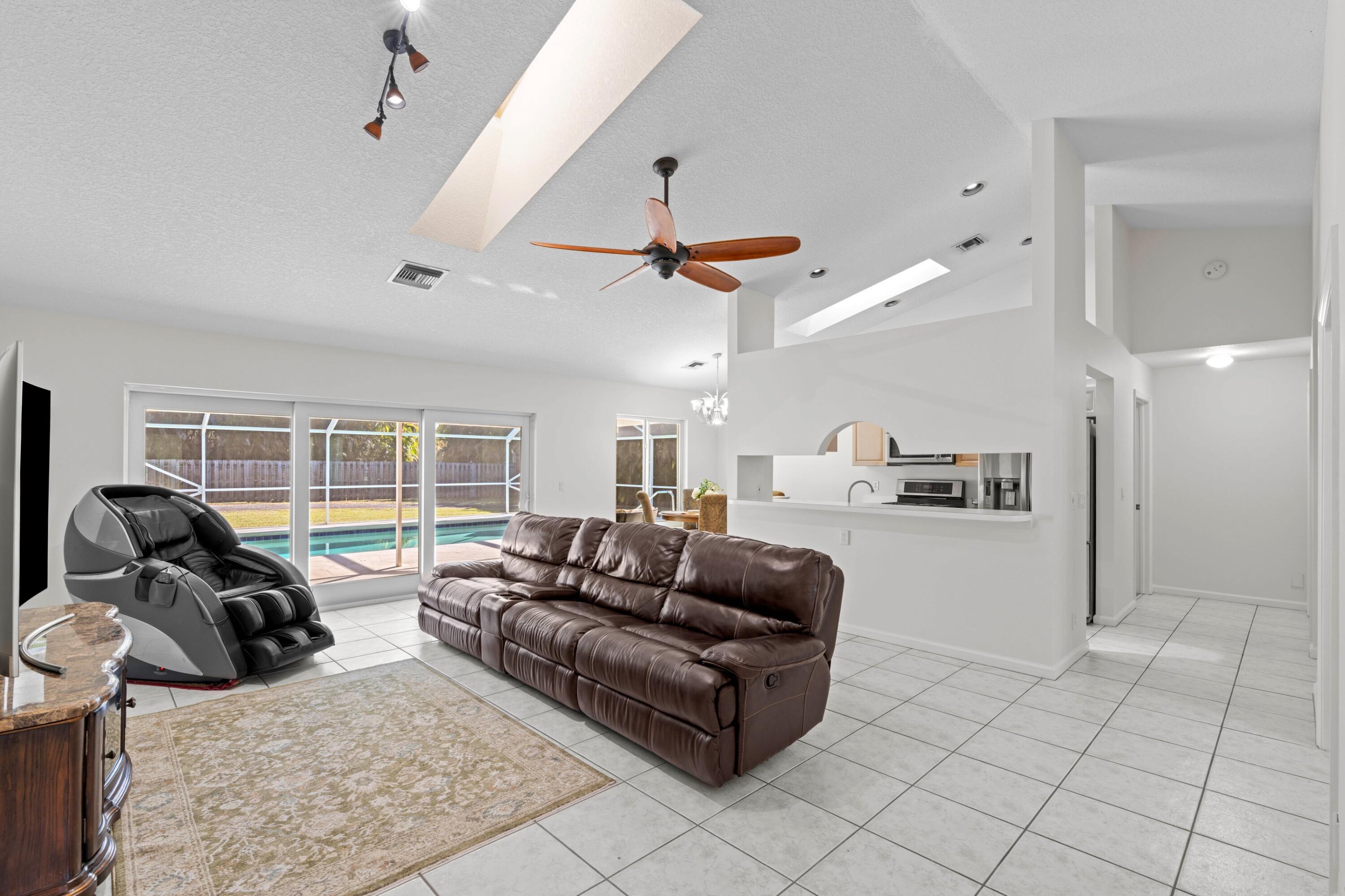 17392 Mellen Lane Jupiter, FL 33478 - Photo 4 of 38 a living room with furniture