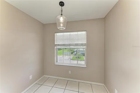 a kitchen with stainless steel appliances a refrigerator sink and cabinets