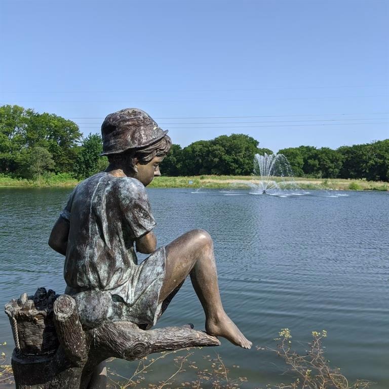 2721 Old Shire Path Road Prosper, TX 75078 - Photo 32 of 39 Community pond with a prominent fountain