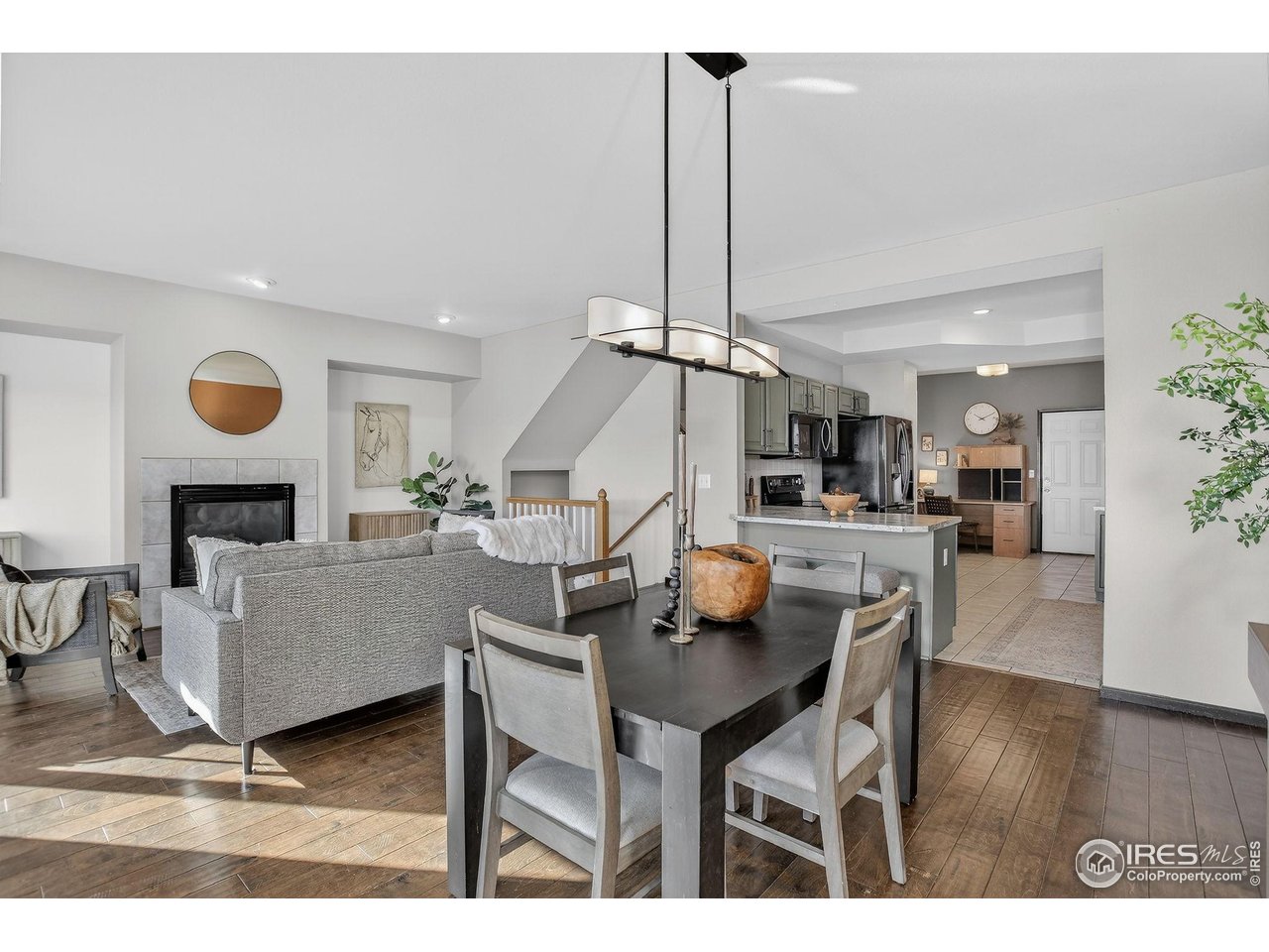 3658 Point Drive Fort Collins, CO 80524 - Photo 16 of 50 a living room with furniture and kitchen view
