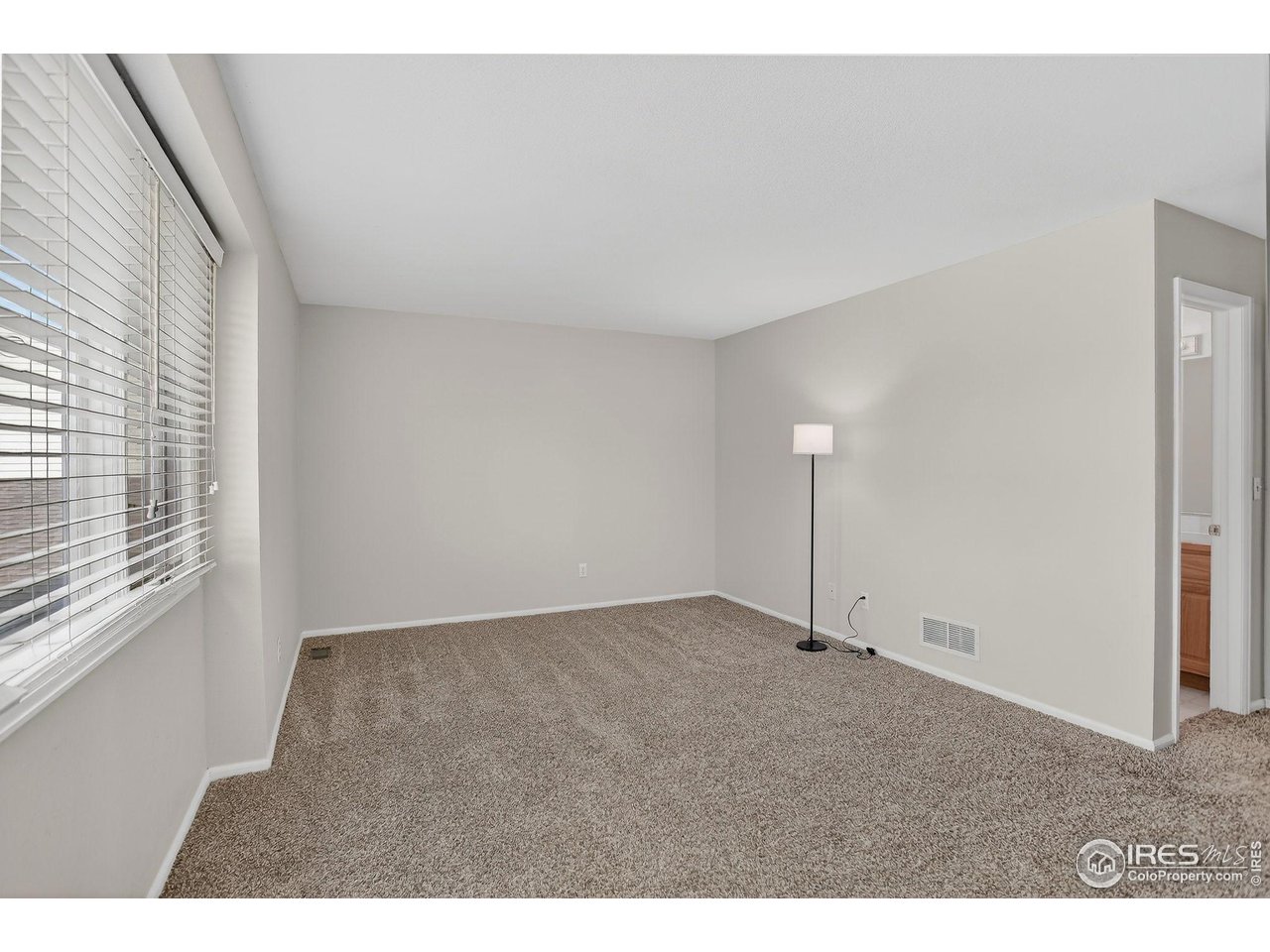 3658 Point Drive Fort Collins, CO 80524 - Photo 34 of 50 a view of an empty room and window