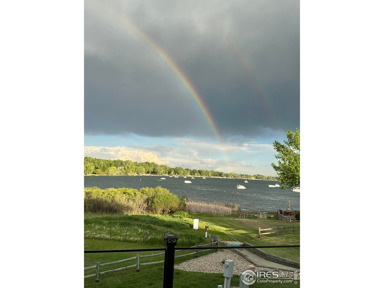 3658 Point Drive Fort Collins, CO 80524 - Photo 46 of 50 a view of a lake from a balcony