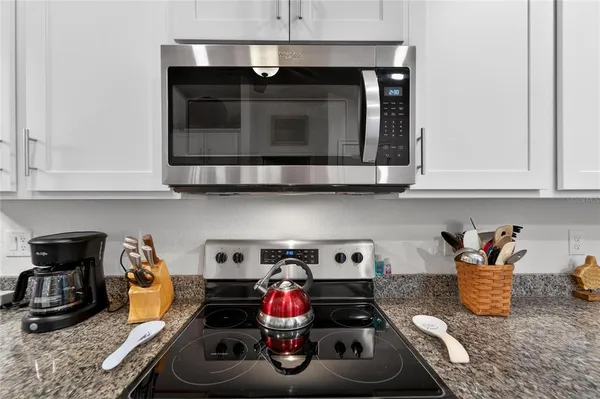 a view of a dining room and kitchen