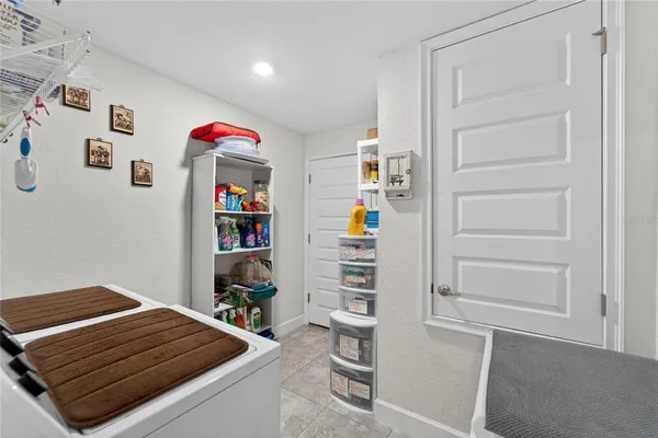a bedroom with a bed and dresser