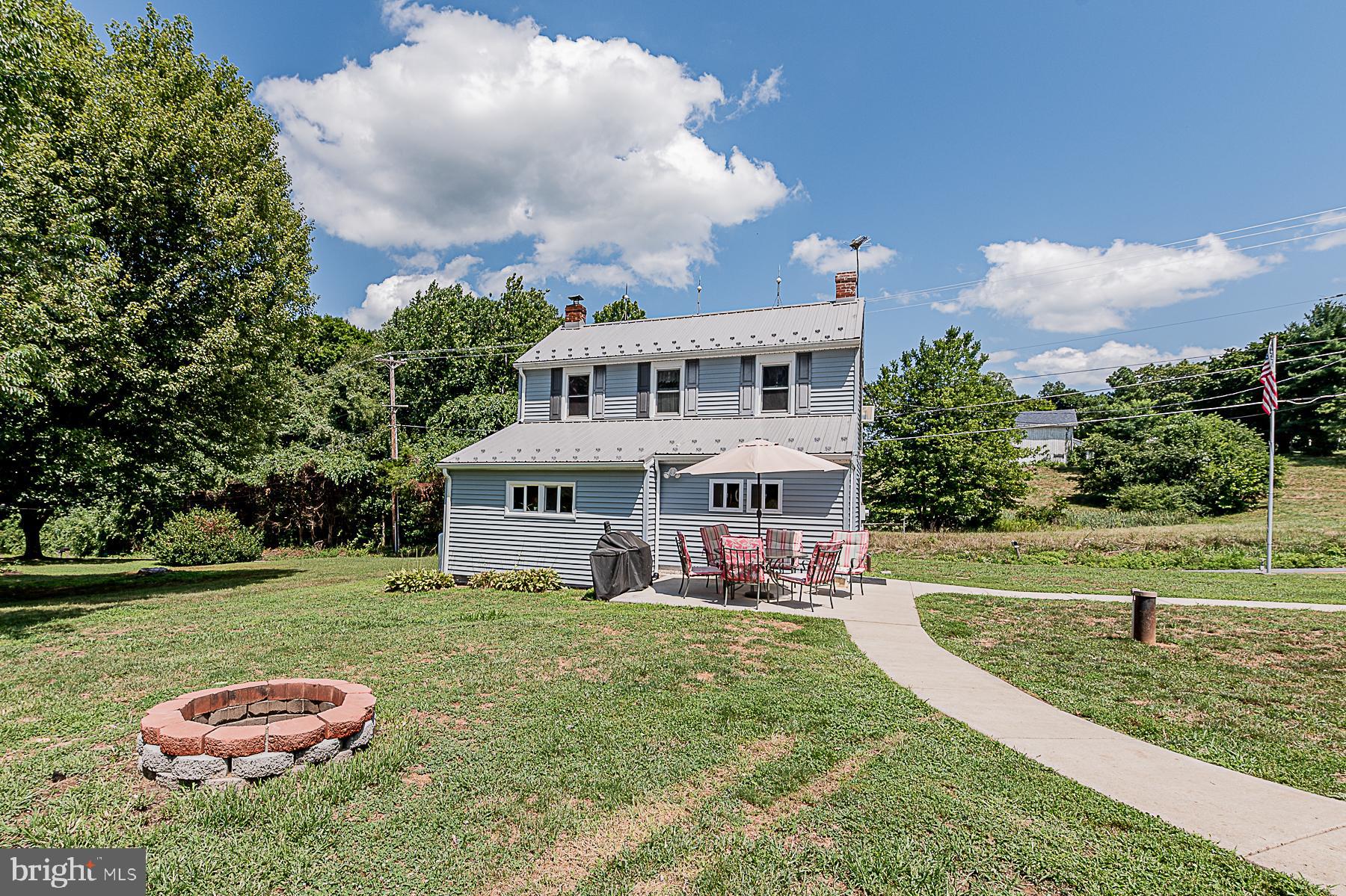 77 Love Run Road Colora, MD 21917 - Photo 14 of 43 a front view of a house with garden