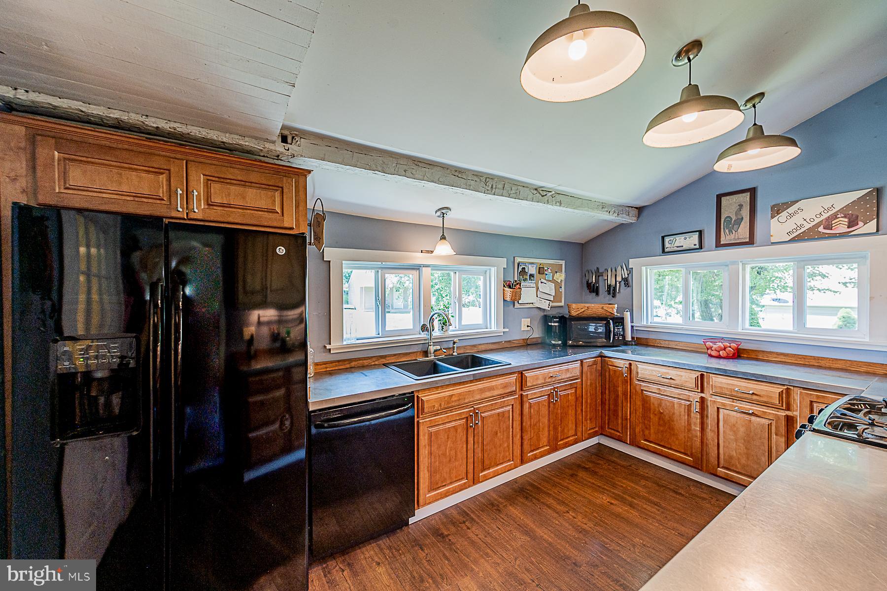 77 Love Run Road Colora, MD 21917 - Photo 17 of 43 a kitchen with lots of counter space and a sink