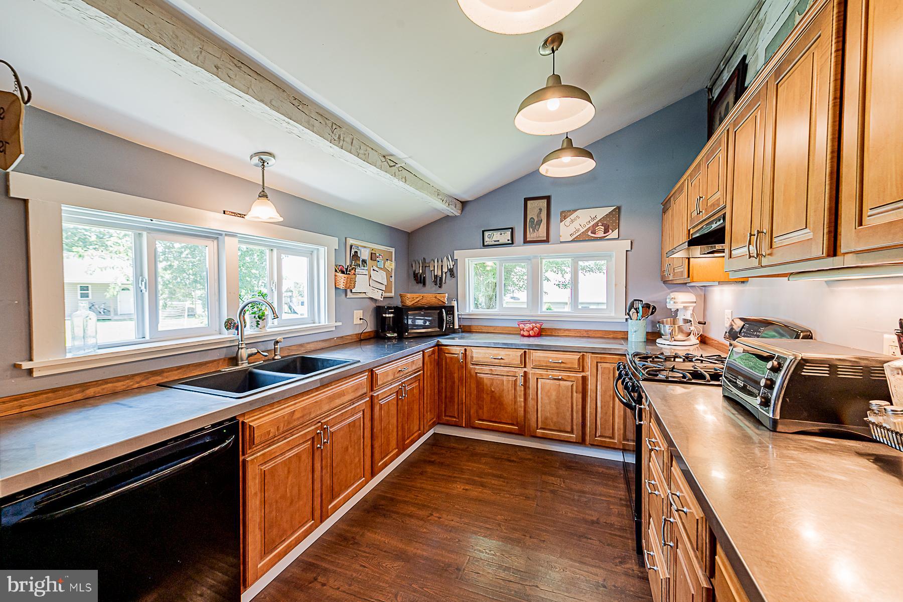 77 Love Run Road Colora, MD 21917 - Photo 19 of 43 a kitchen with lots of counter top space and appliances