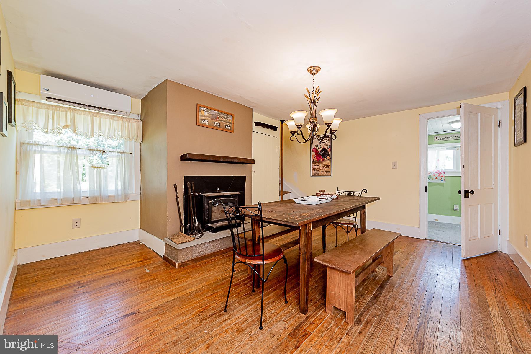 77 Love Run Road Colora, MD 21917 - Photo 21 of 43 a view of a dining room with furniture window and wooden floor