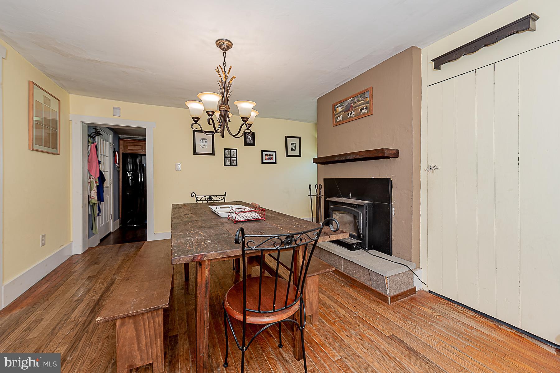 77 Love Run Road Colora, MD 21917 - Photo 23 of 43 a view of a dining room with furniture and wooden floor
