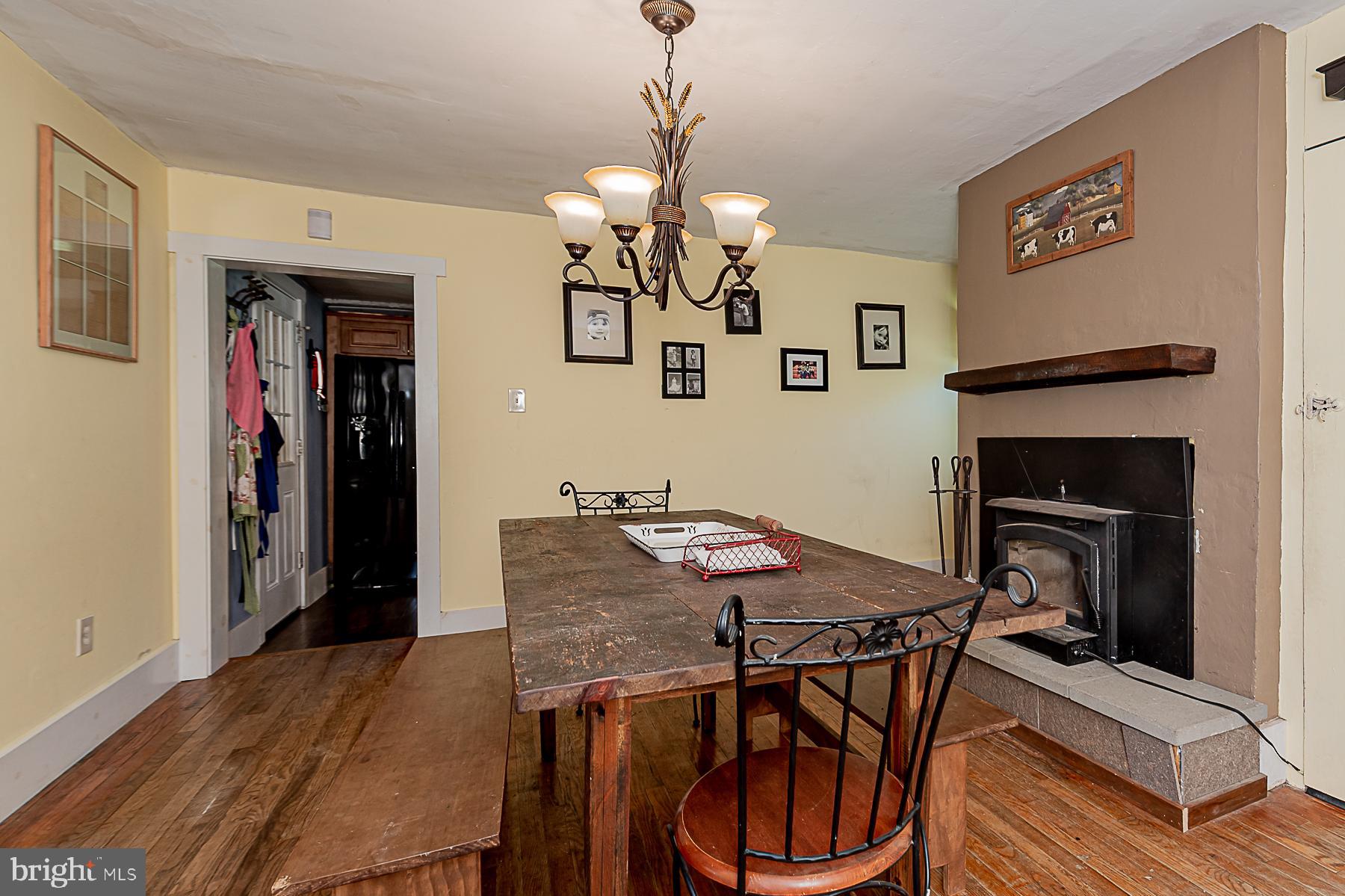 77 Love Run Road Colora, MD 21917 - Photo 24 of 43 a view of a dining room with furniture and wooden floor