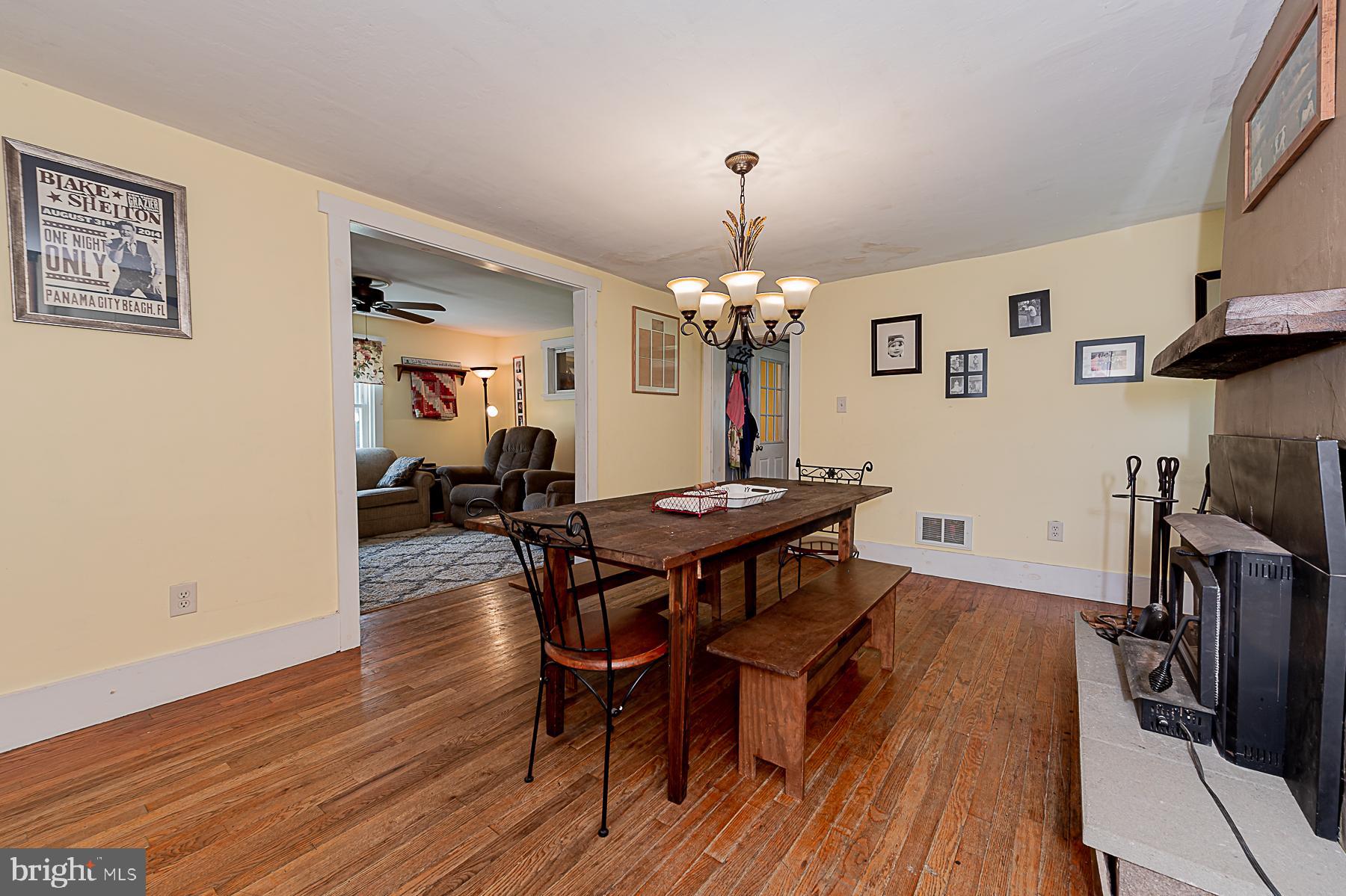 77 Love Run Road Colora, MD 21917 - Photo 25 of 43 a view of a dining room with furniture and wooden floor
