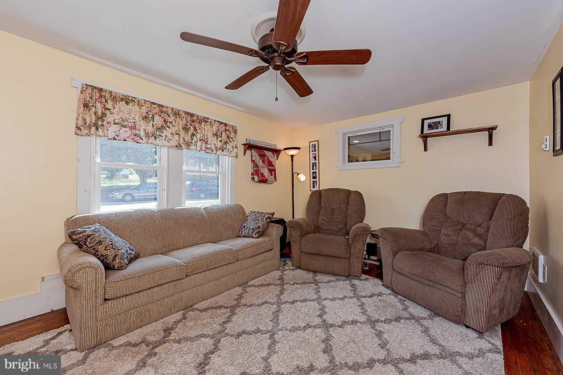 77 Love Run Road Colora, MD 21917 - Photo 26 of 43 a living room with furniture and a large window