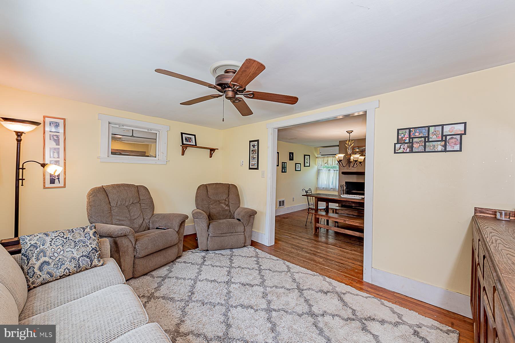 77 Love Run Road Colora, MD 21917 - Photo 27 of 43 a living room with furniture and a rug
