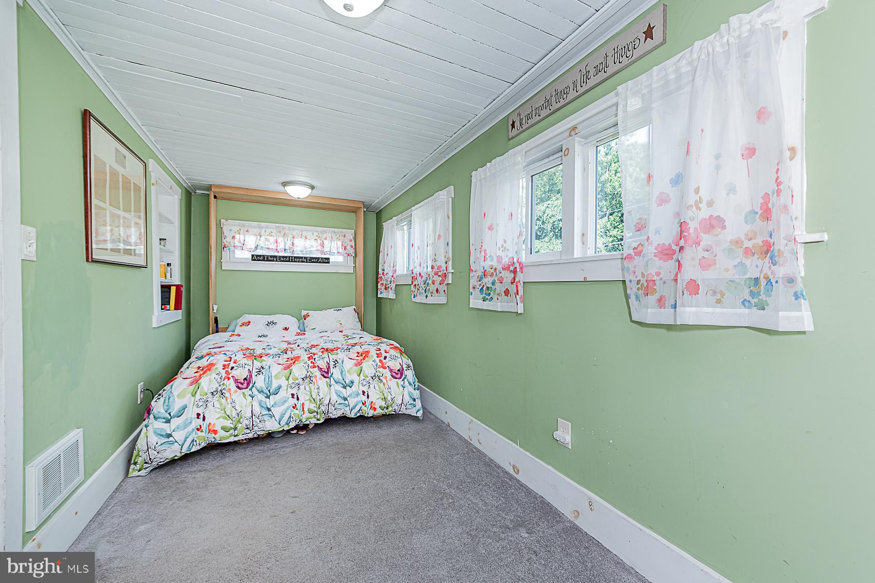77 Love Run Road Colora, MD 21917 - Photo 29 of 43 a bedroom with a bed and window