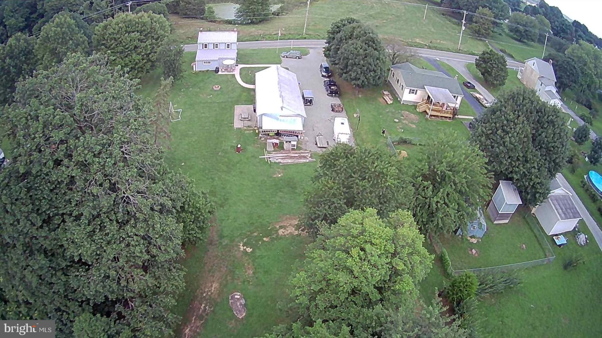 77 Love Run Road Colora, MD 21917 - Photo 43 of 43 an aerial view of residential houses with outdoor space and trees