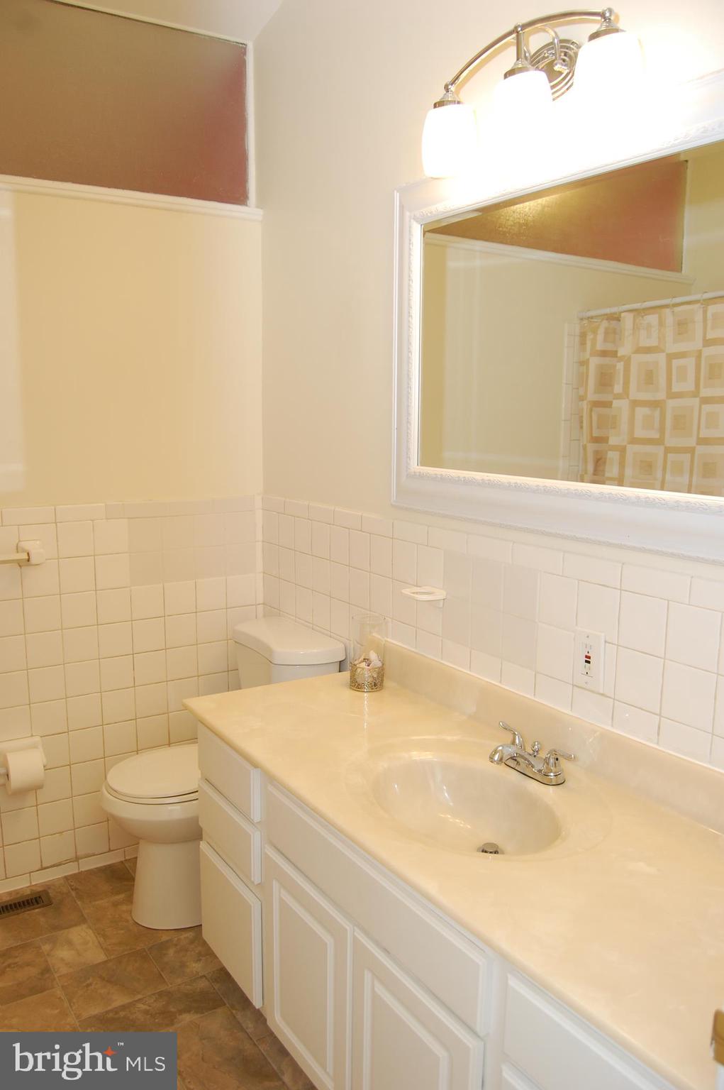 818 Hopewood Road Pikesville, MD 21208 - Photo 14 of 24 Hall Bathroom