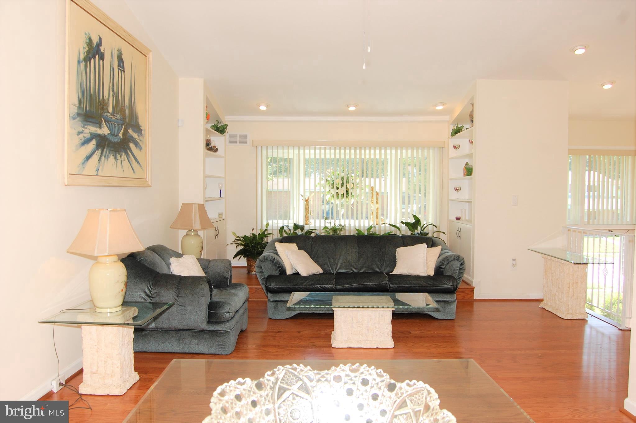 818 Hopewood Road Pikesville, MD 21208 - Photo 3 of 24 Living Room w/Step Up & Cathedral Ceilings