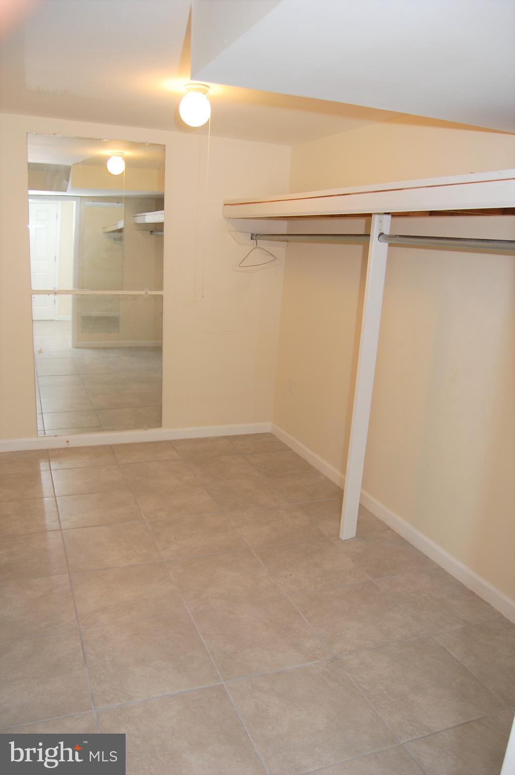 818 Hopewood Road Pikesville, MD 21208 - Photo 22 of 24 Lower Level Walk-In Closet