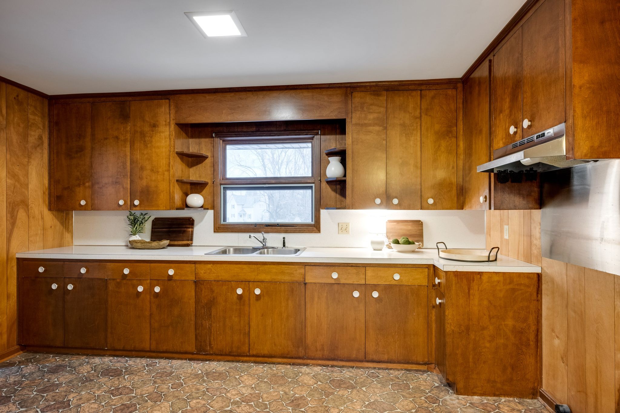 112 Lake Valley Road Dickson, TN 37055 - Photo 15 of 46 a kitchen with stainless steel appliances granite countertop a sink and a stove