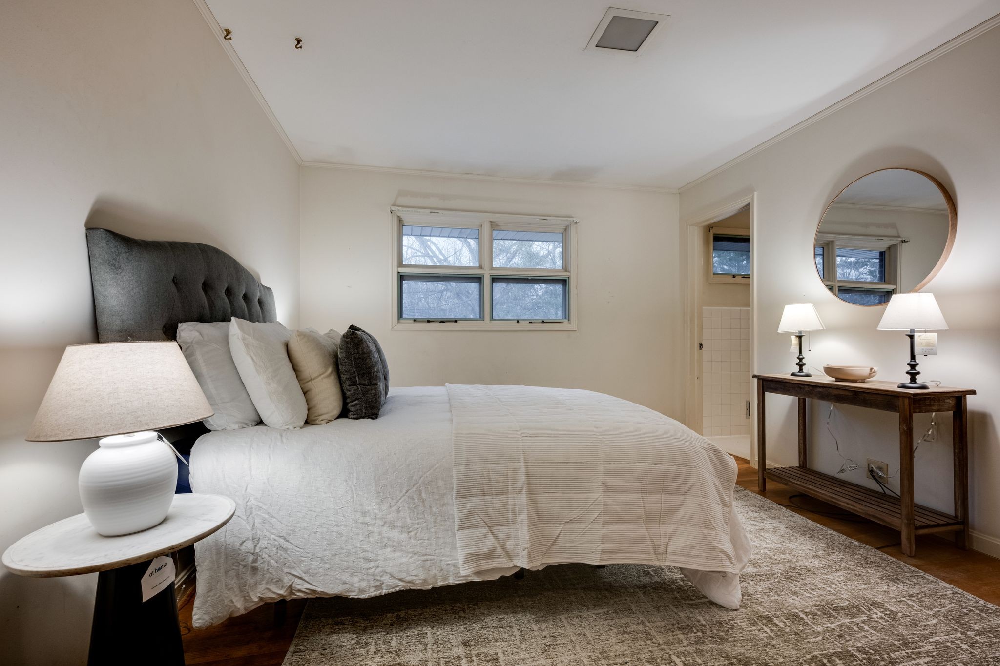 112 Lake Valley Road Dickson, TN 37055 - Photo 17 of 46 a bedroom with a bed and a lamp