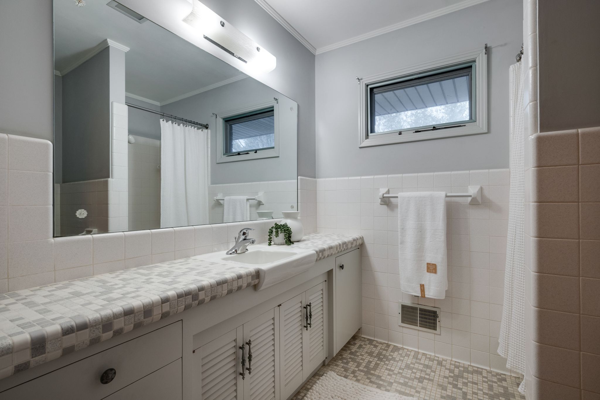 112 Lake Valley Road Dickson, TN 37055 - Photo 23 of 46 a bathroom with a sink and a mirror