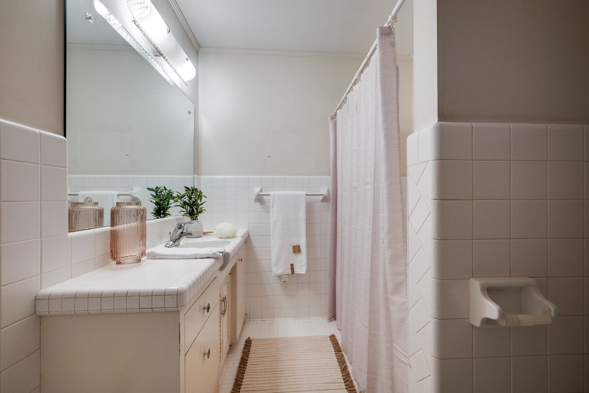 112 Lake Valley Road Dickson, TN 37055 - Photo 24 of 46 a bathroom with a granite countertop sink a vanity and a shower