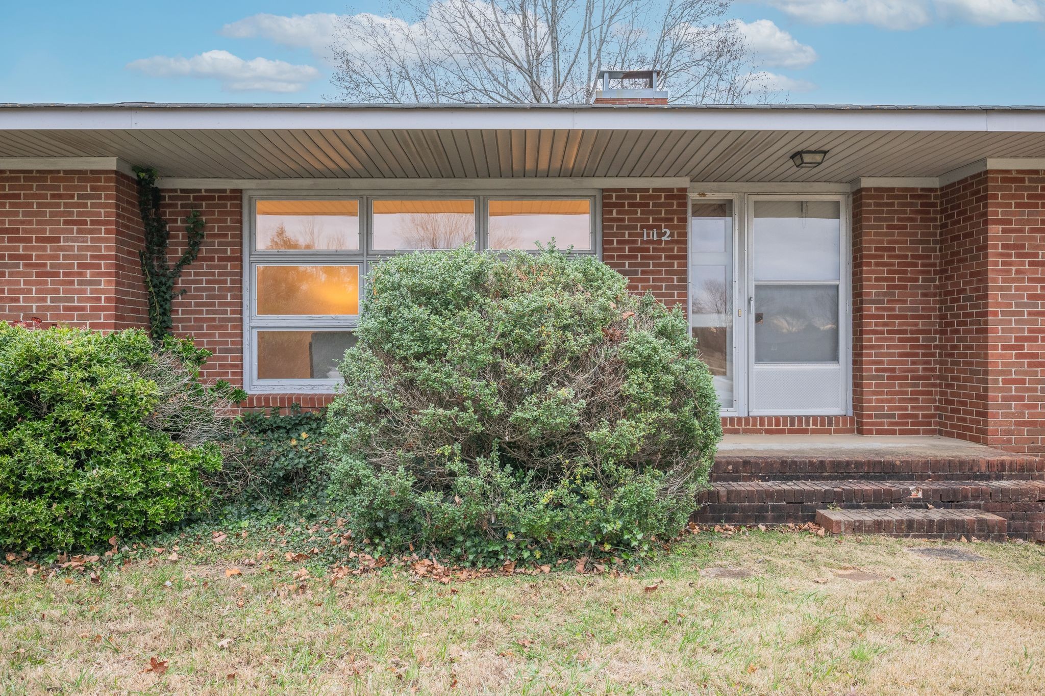 112 Lake Valley Road Dickson, TN 37055 - Photo 28 of 46 a front view of a house with garden