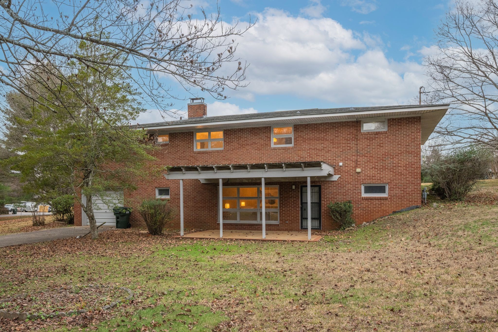 112 Lake Valley Road Dickson, TN 37055 - Photo 31 of 46 a front view of a house with a yard and garage