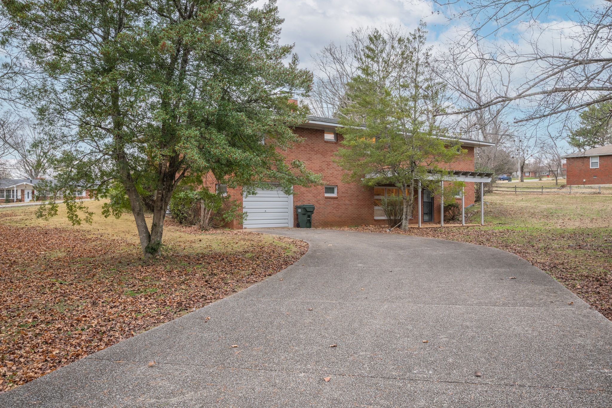 112 Lake Valley Road Dickson, TN 37055 - Photo 36 of 46 a view of a house with a tree