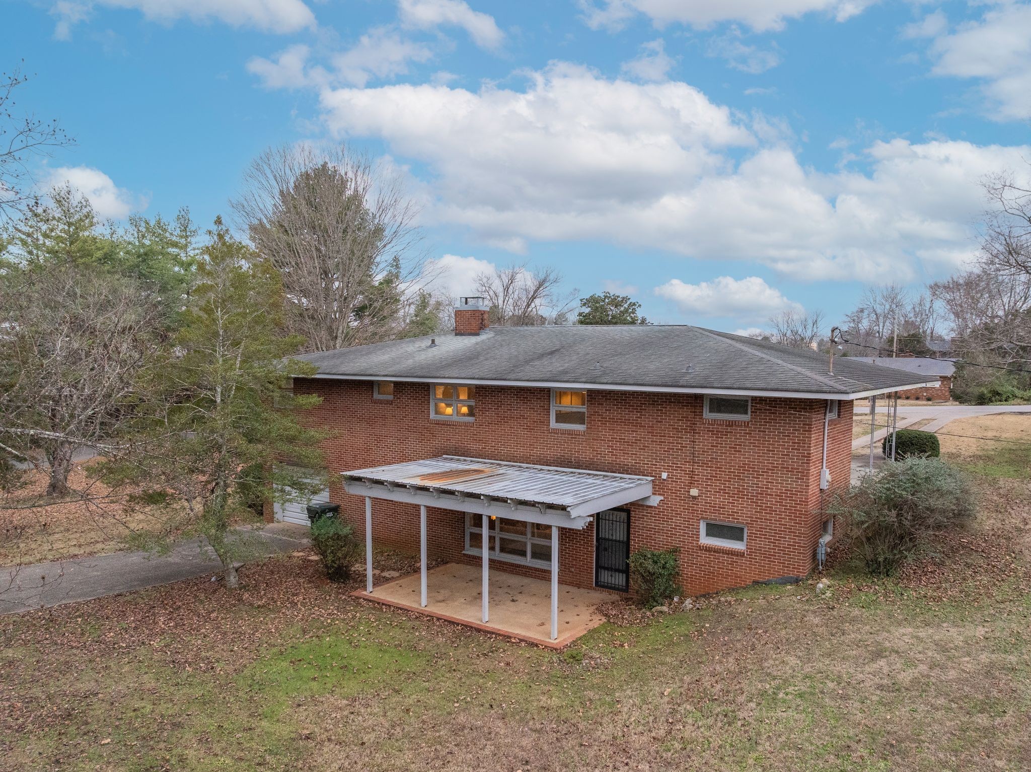 112 Lake Valley Road Dickson, TN 37055 - Photo 37 of 46 an aerial view of a house with yard and trampoline