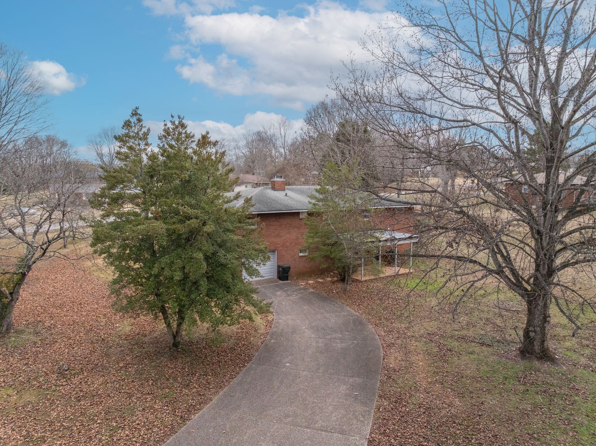 112 Lake Valley Road Dickson, TN 37055 - Photo 41 of 46 a view of a dry yard with trees