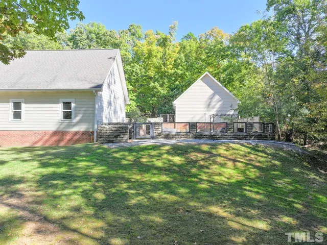a group of people sitting in front of a store