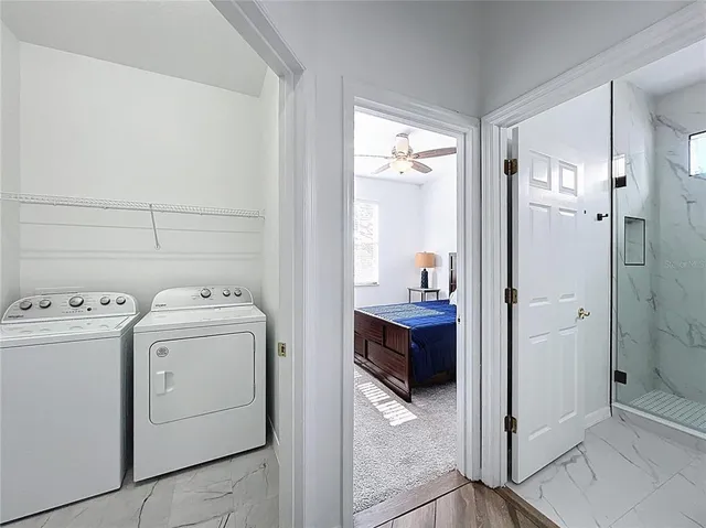 a view of utility room with washer and dryer
