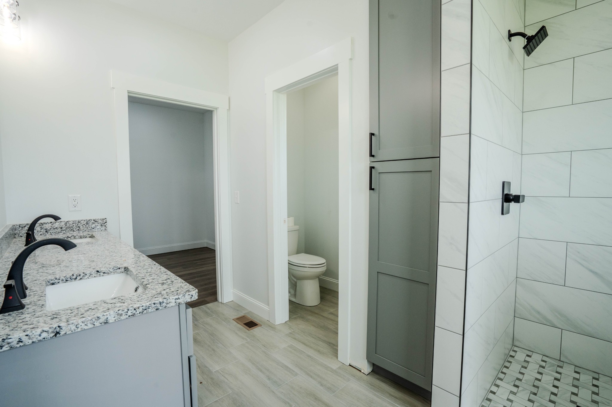 0 Beartown Road Loretto, TN 38469 - Photo 31 of 46 a bathroom with a granite countertop sink toilet and shower