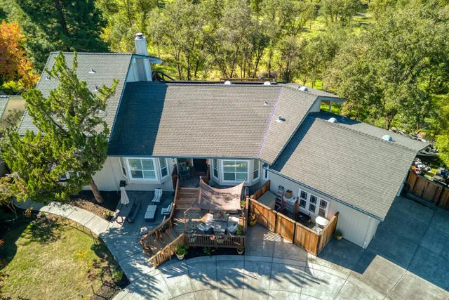 swimming pool view with a seating space
