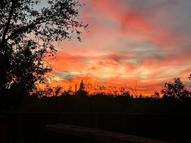 an aerial view of a house with swimming pool