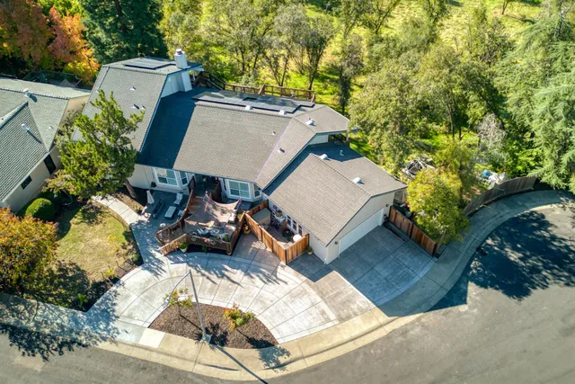 a wooden fence with trees in the background